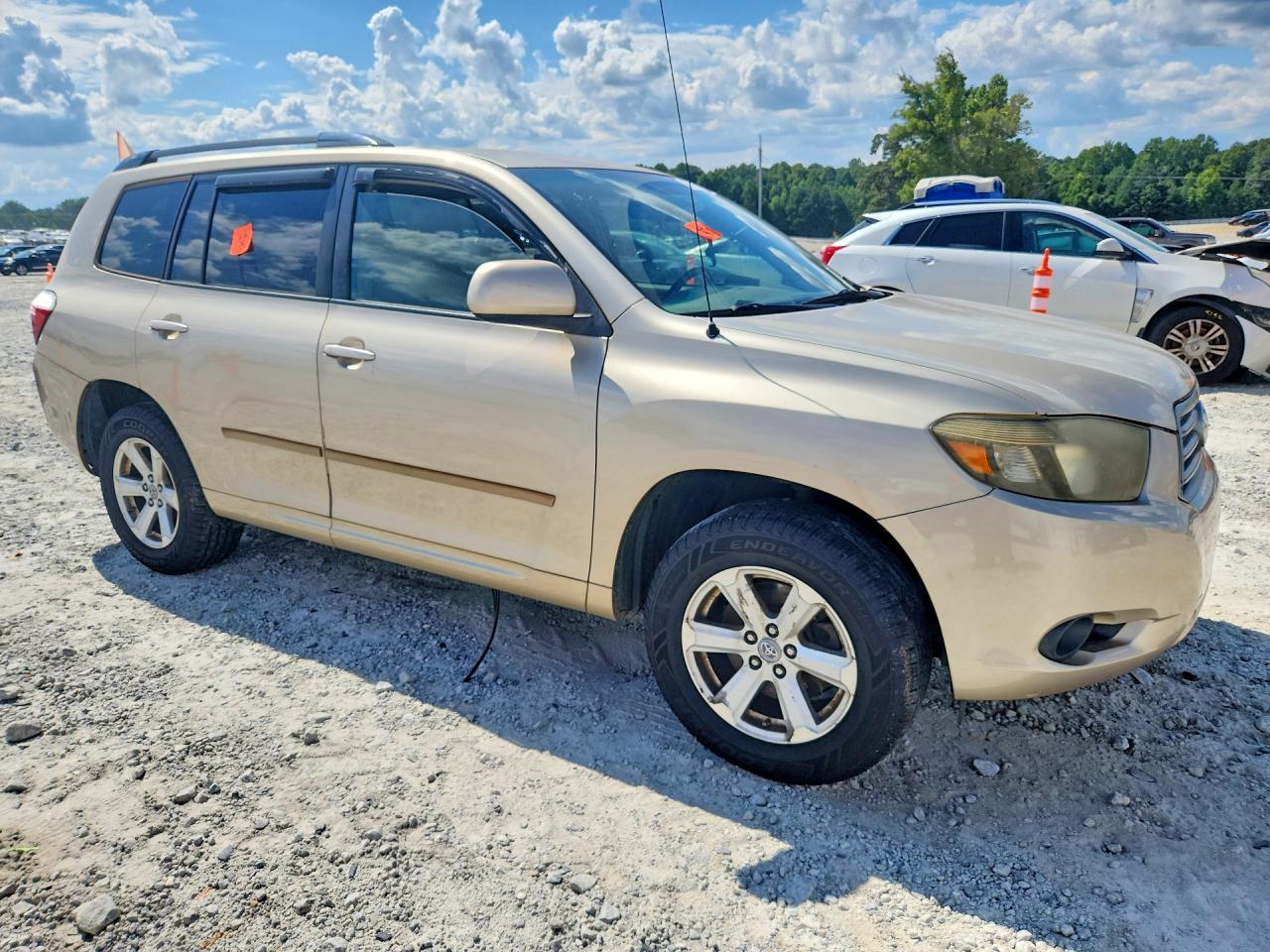 2009 Toyota Highlander Base Gold vin: JTEDS41A892082003