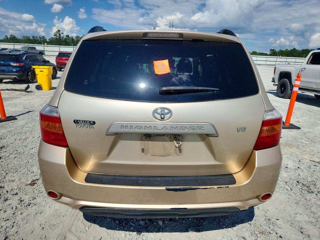 2009 Toyota Highlander Base Gold vin: JTEDS41A892082003