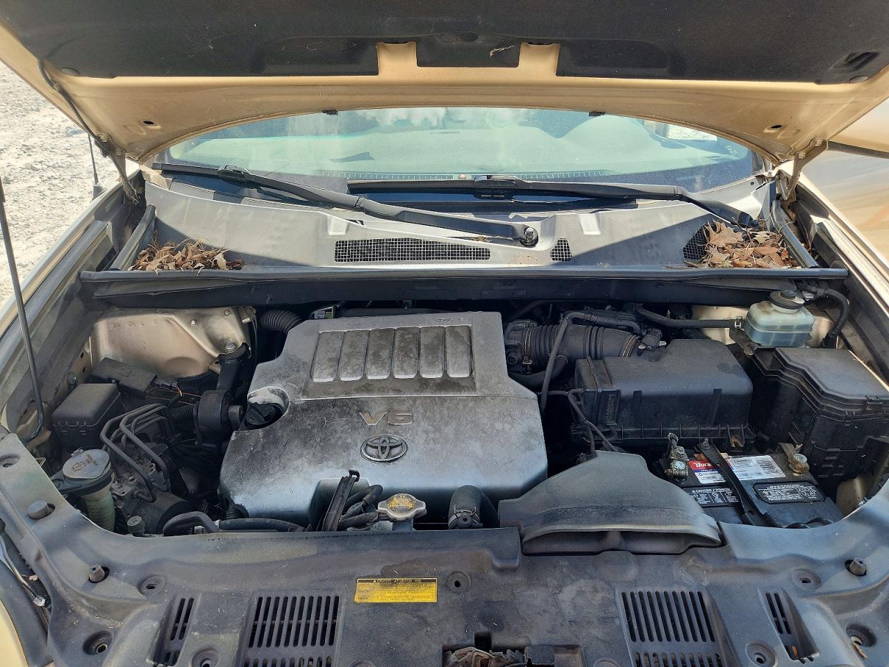 2009 Toyota Highlander Base Gold vin: JTEDS41A892082003