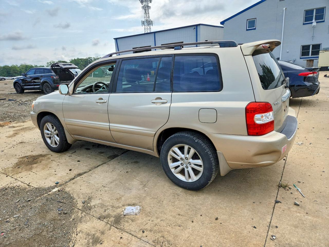 2006 Toyota Highlander Hybrid Gold vin: JTEDW21A260001593