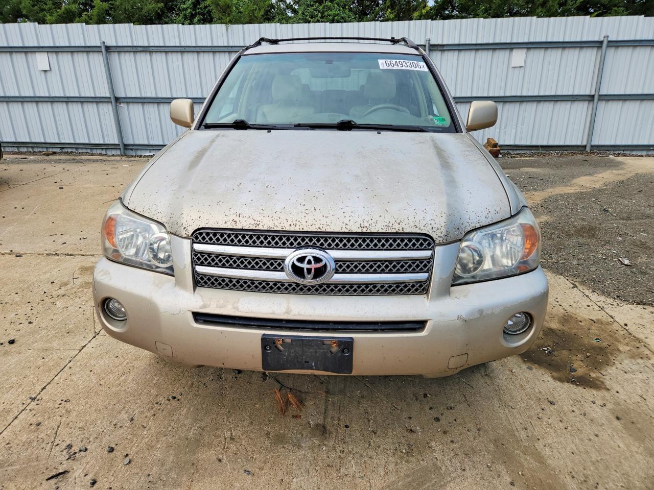 2006 Toyota Highlander Hybrid Gold vin: JTEDW21A260001593