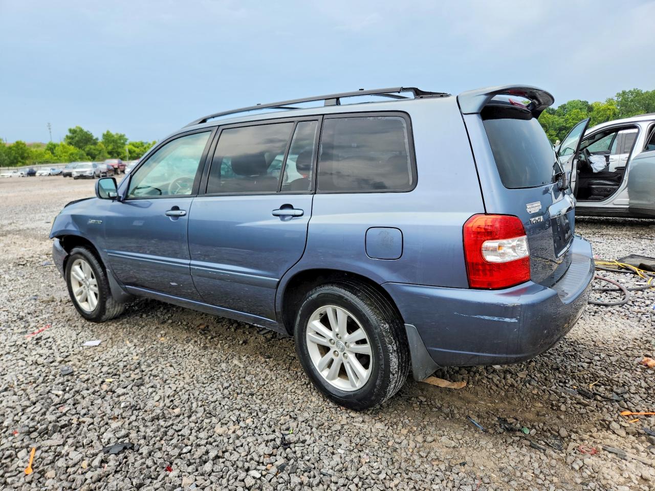 2006 Toyota Highlander Hybrid Blue vin: JTEDW21A260004400