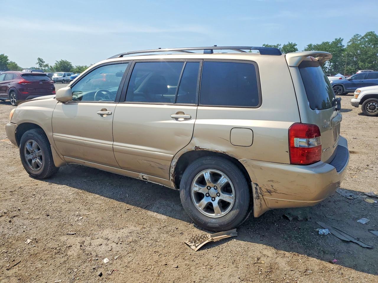 2007 Toyota Highlander Base Tan vin: JTEEP21A670210497