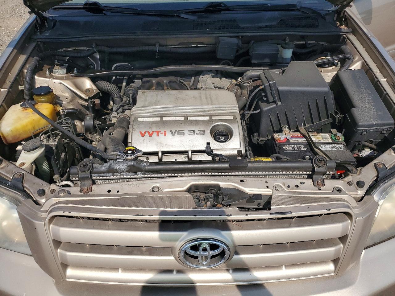 2007 Toyota Highlander Base Tan vin: JTEEP21A670210497