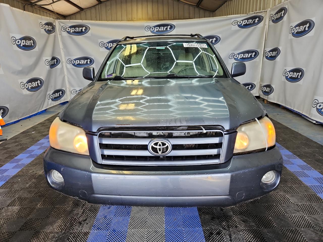 2006 Toyota Highlander Limited Blue vin: JTEEP21A760153760 Damage: Left Head Lamp, Faded, Repair Required