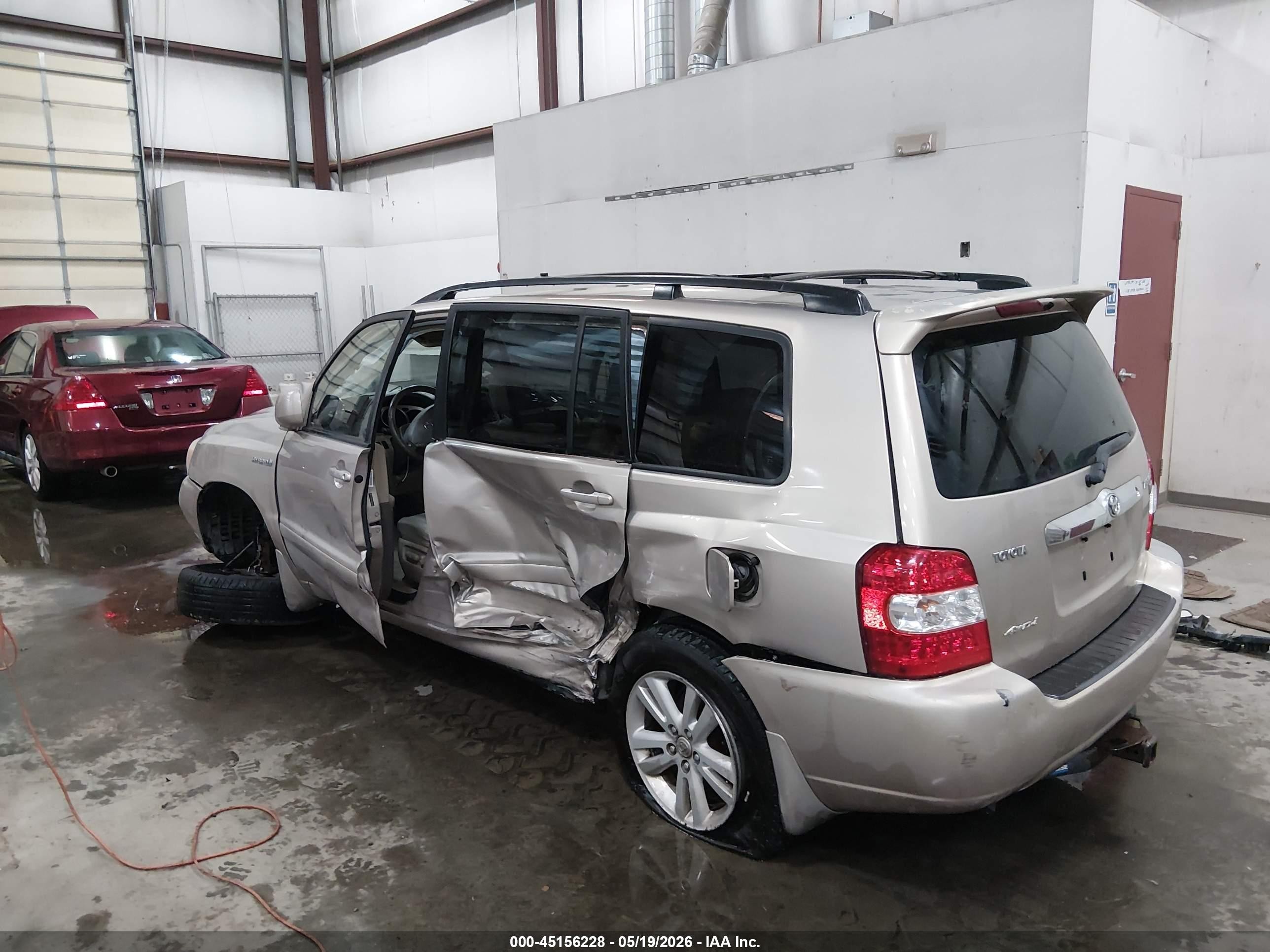 2006 Toyota Highlander Hybrid V6 Gold vin: JTEEW21A360032226