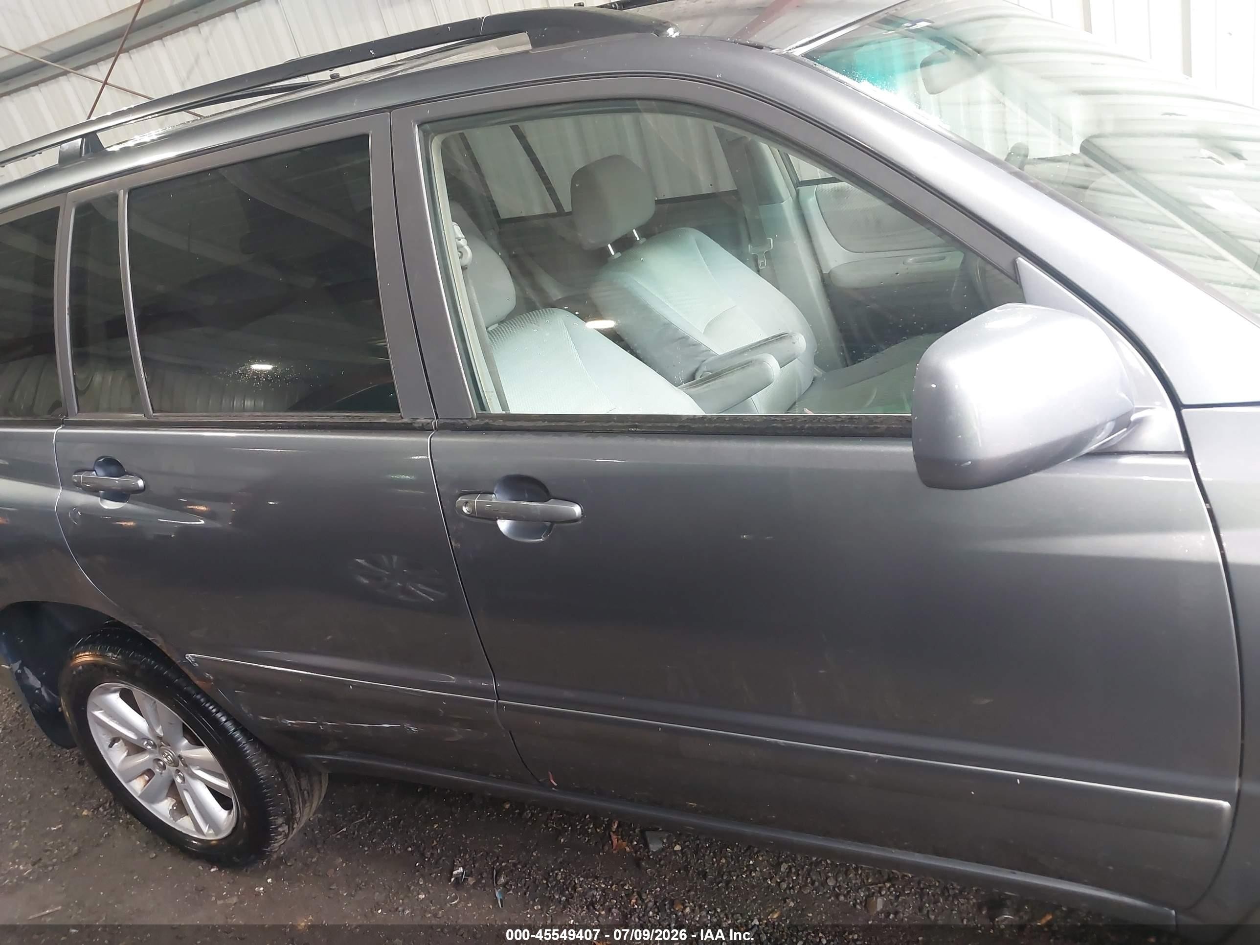 2006 Toyota Highlander Hybrid V6 Blue vin: JTEEW21A760013114