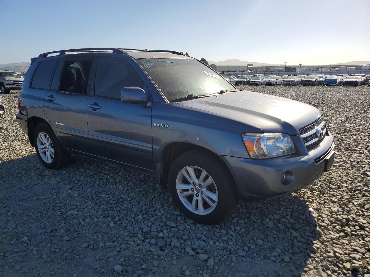 2006 Toyota Highlander Hybrid Blue vin: JTEEW21A760030902