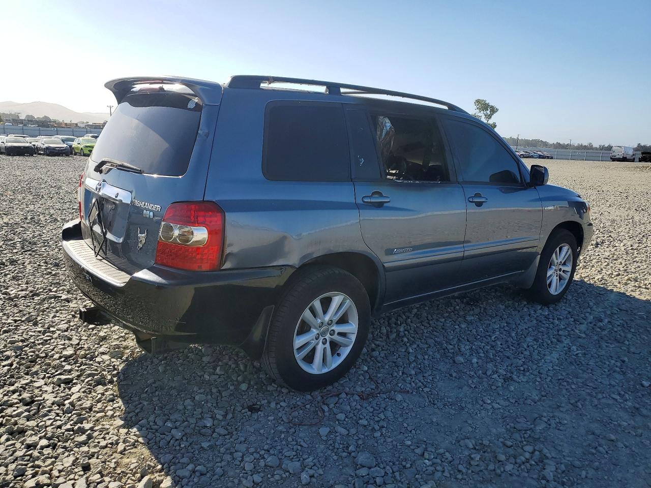 2006 Toyota Highlander Hybrid Blue vin: JTEEW21A760030902