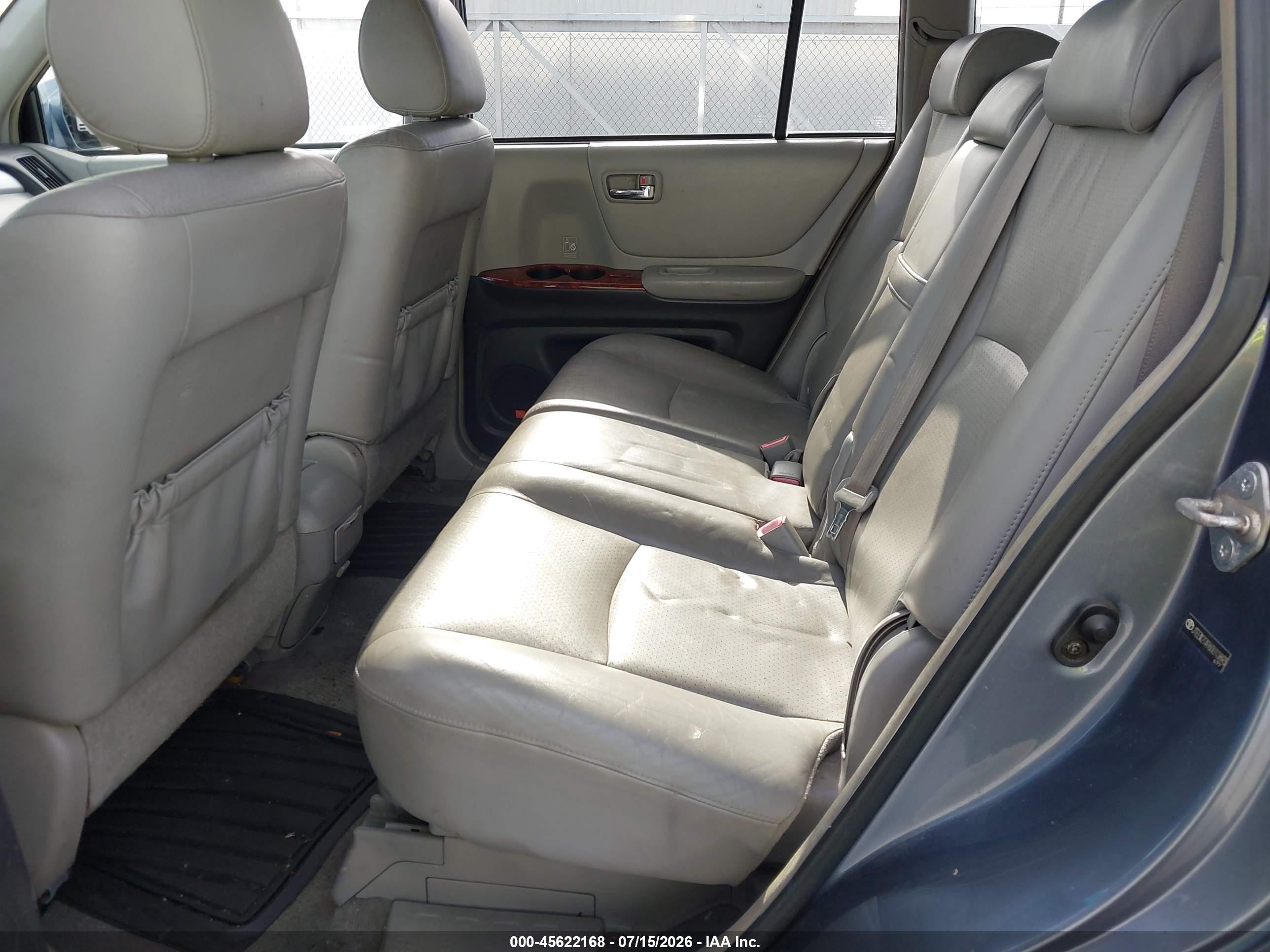 2006 Toyota Highlander Hybrid Limited V6 Light Blue vin: JTEEW21A960010893