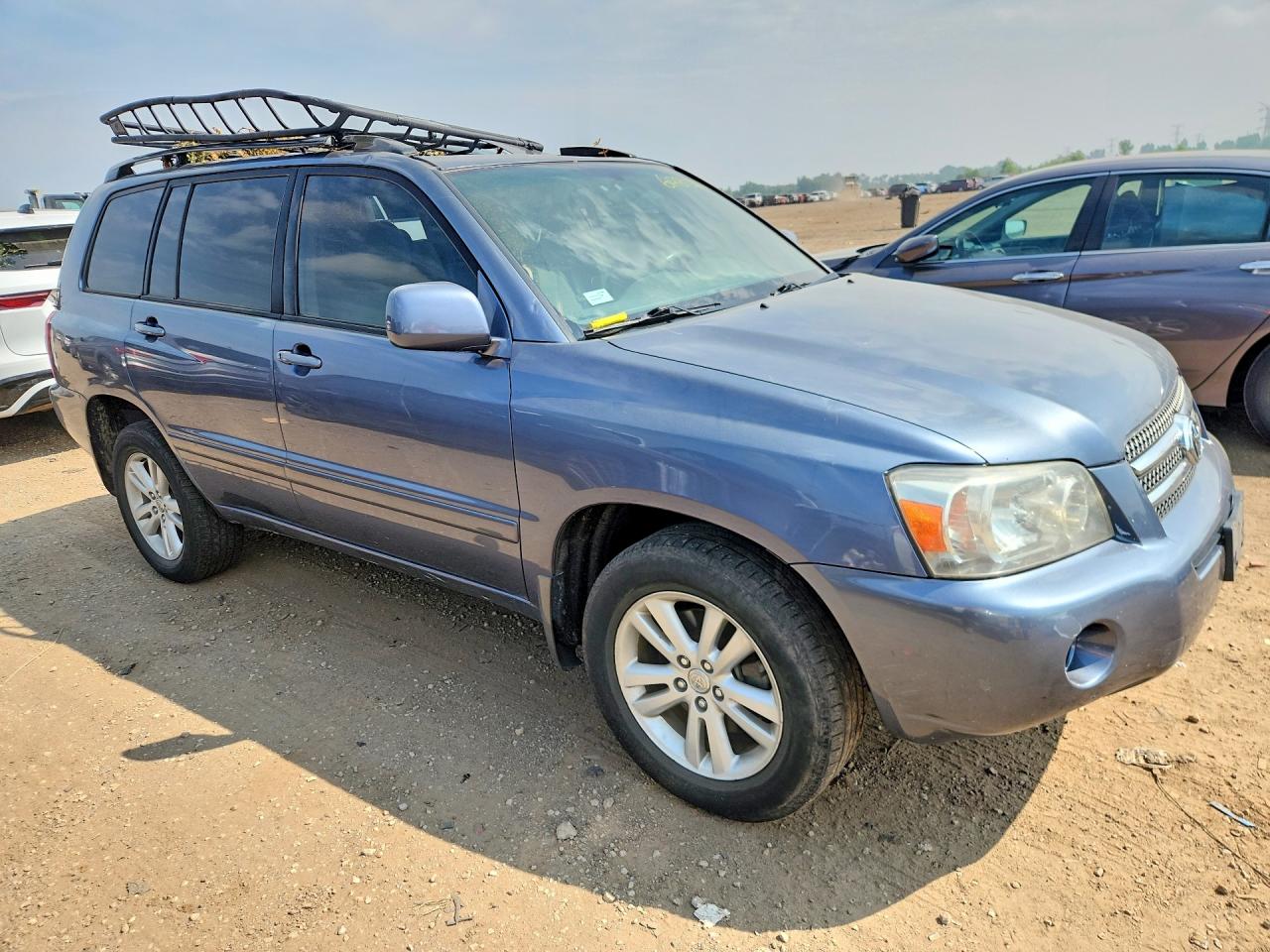 2006 Toyota Highlander Hybrid Blue vin: JTEEW21AX60016105