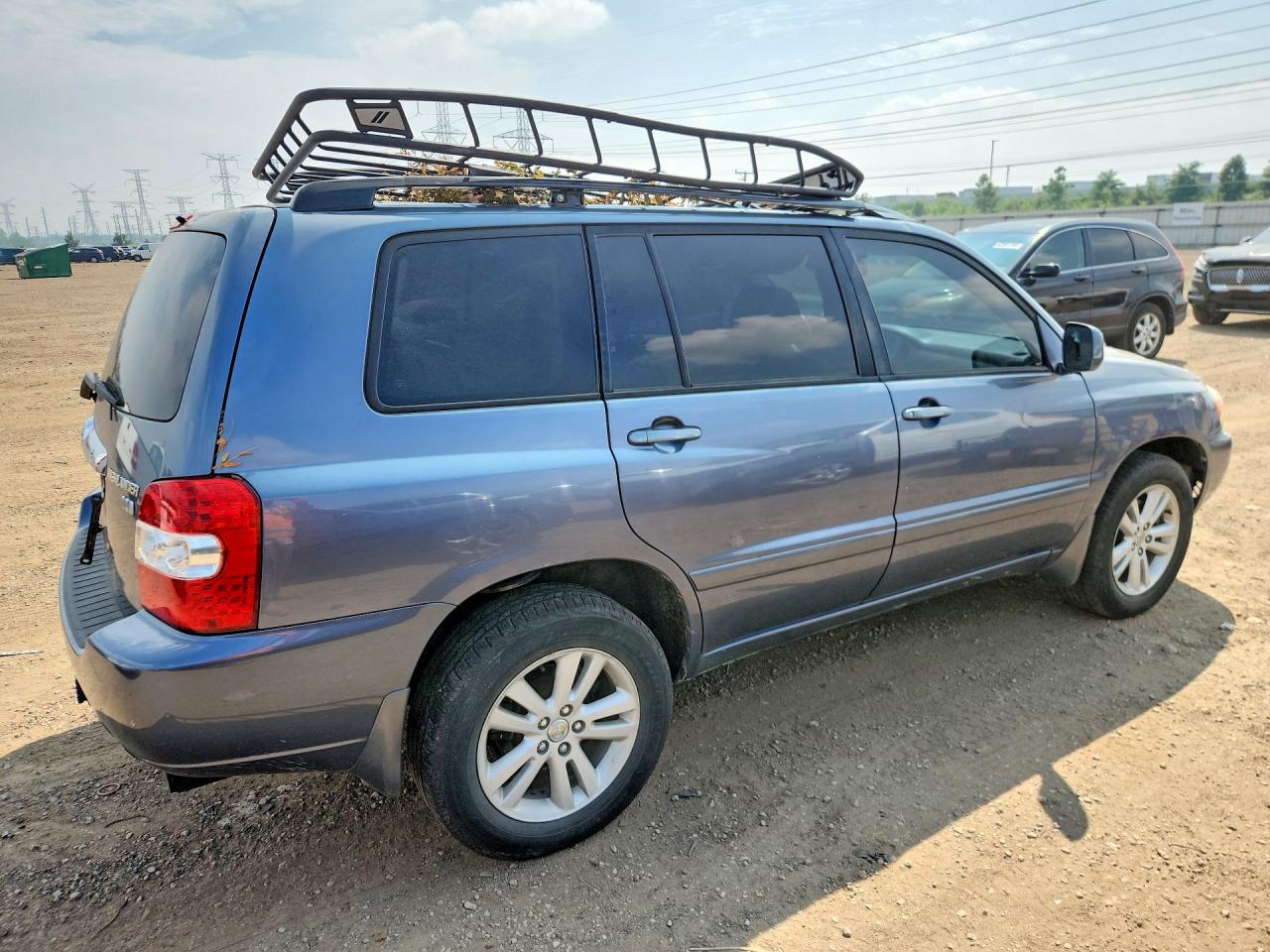 2006 Toyota Highlander Hybrid Blue vin: JTEEW21AX60016105