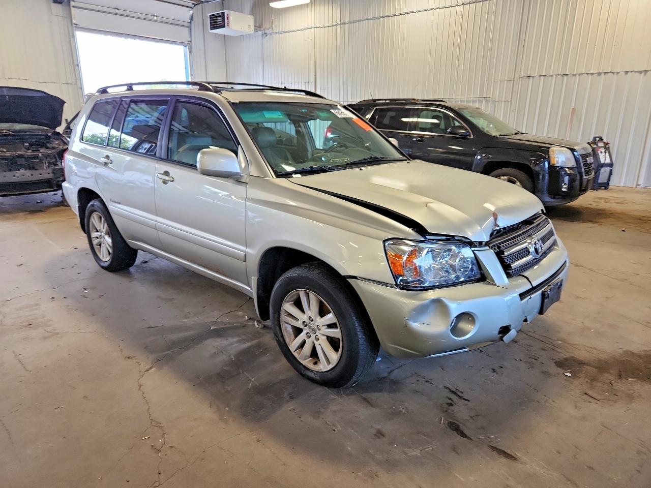 2006 Toyota Highlander Hybrid Gold vin: JTEEW21AX60022146