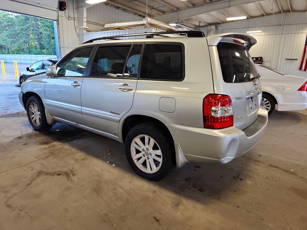2006 Toyota Highlander Hybrid Gold vin: JTEEW21AX60022146