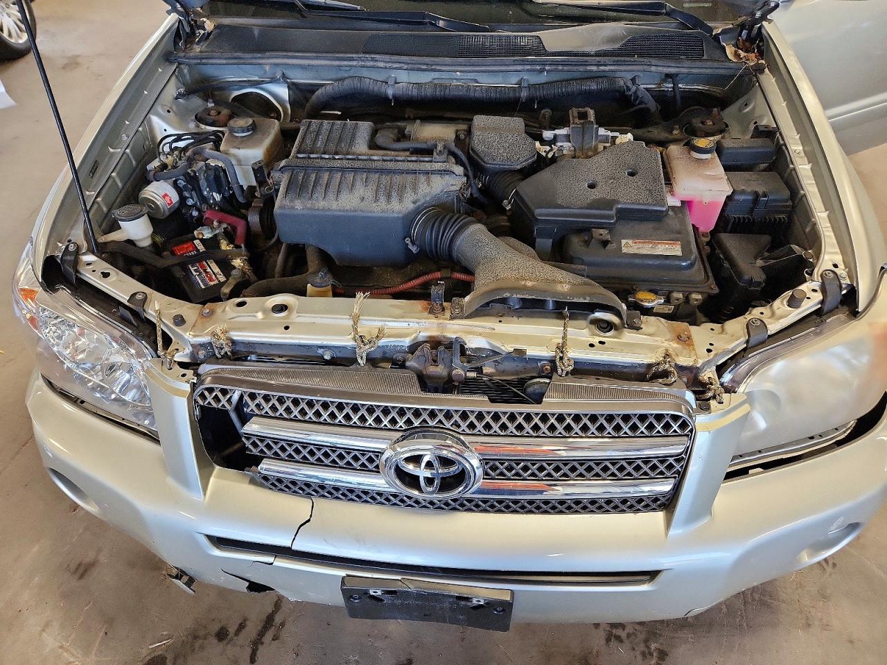 2006 Toyota Highlander Hybrid Gold vin: JTEEW21AX60022146