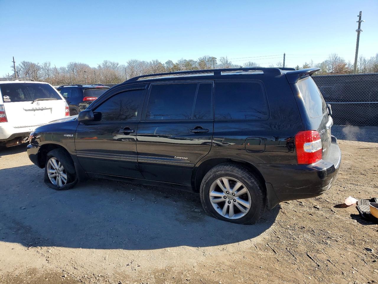2006 Toyota Highlander Hybrid Black vin: JTEEW21AX60030862