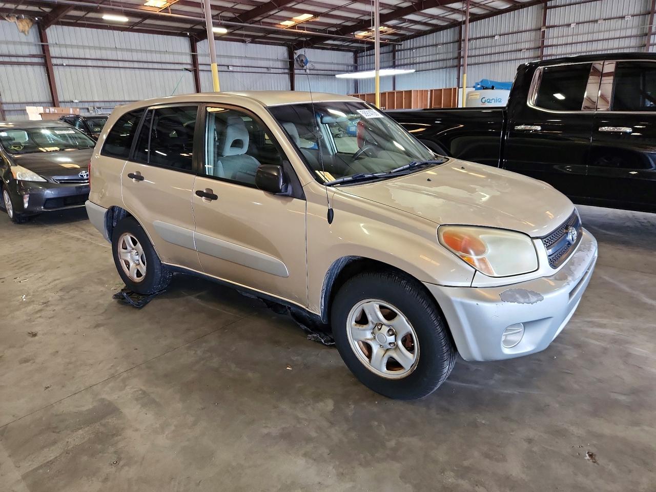 2004 Toyota Rav4 Base Gold vin: JTEGD20V240024523