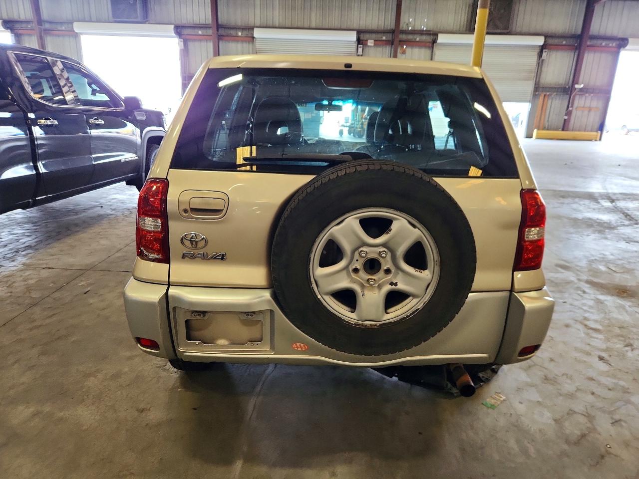 2004 Toyota Rav4 Base Gold vin: JTEGD20V240024523