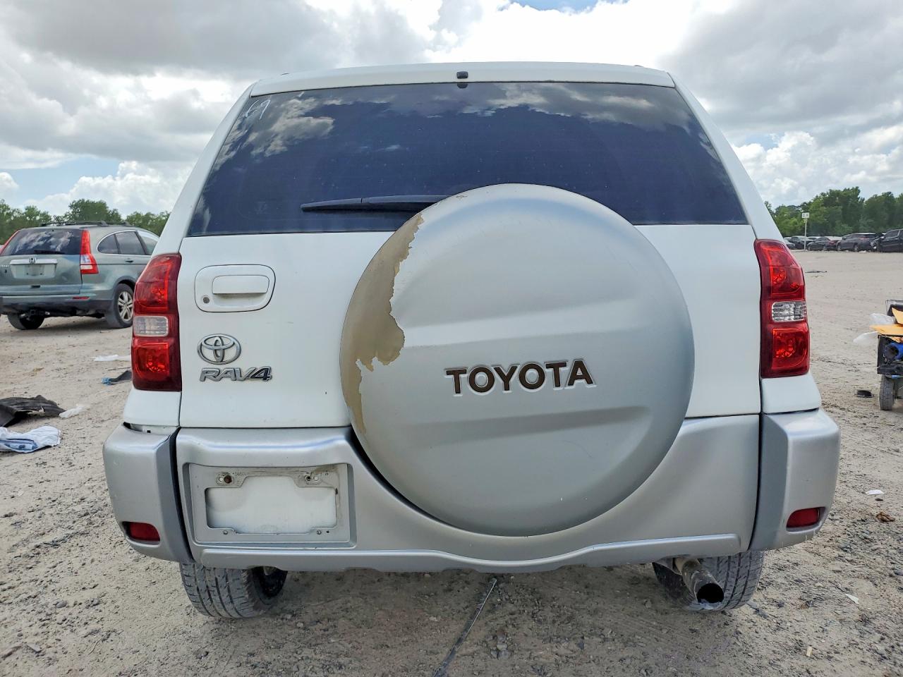 2004 Toyota Rav4 Base White vin: JTEGD20V640003383
