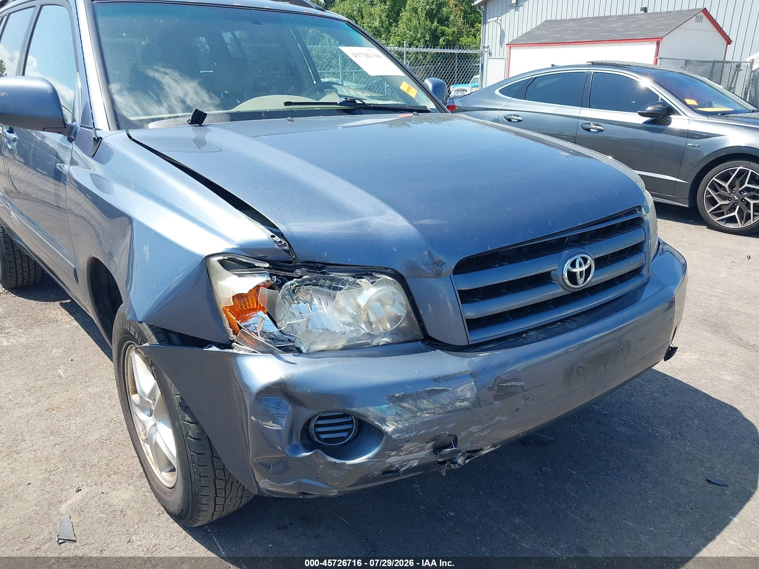 2006 Toyota Highlander   Blue vin: JTEGD21A260142697