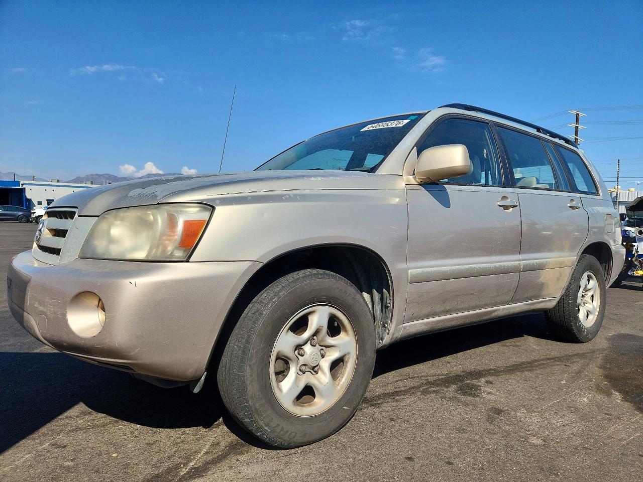 2007 Toyota Highlander Base Tan vin: JTEGD21A470165819