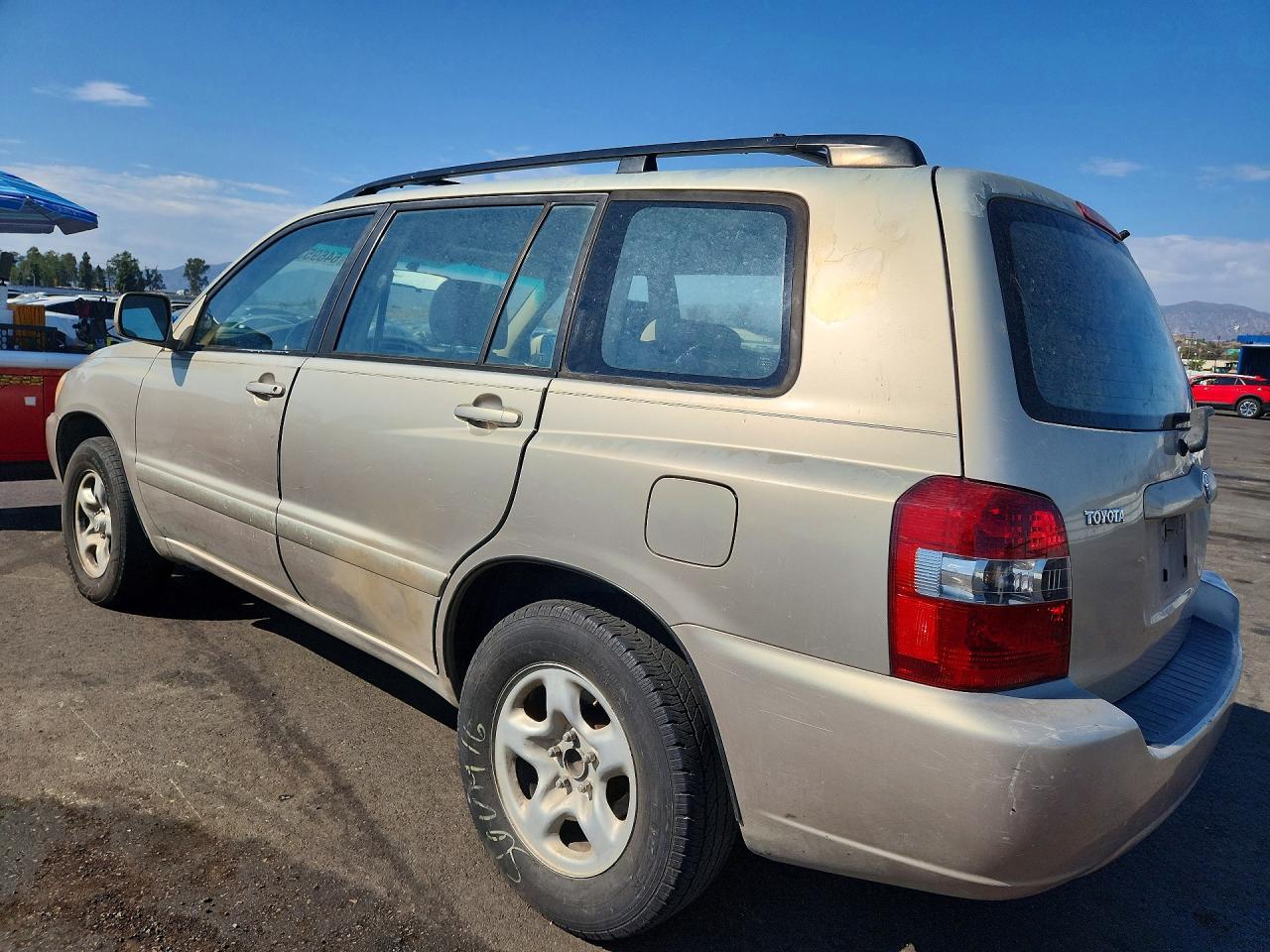 2007 Toyota Highlander Base Tan vin: JTEGD21A470165819