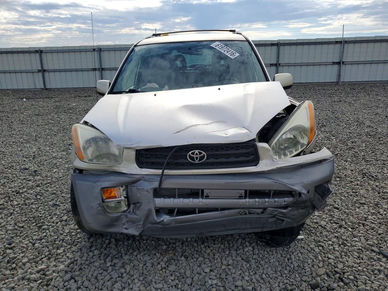 2001 Toyota Rav4 Base Tan vin: JTEGH20V110040390