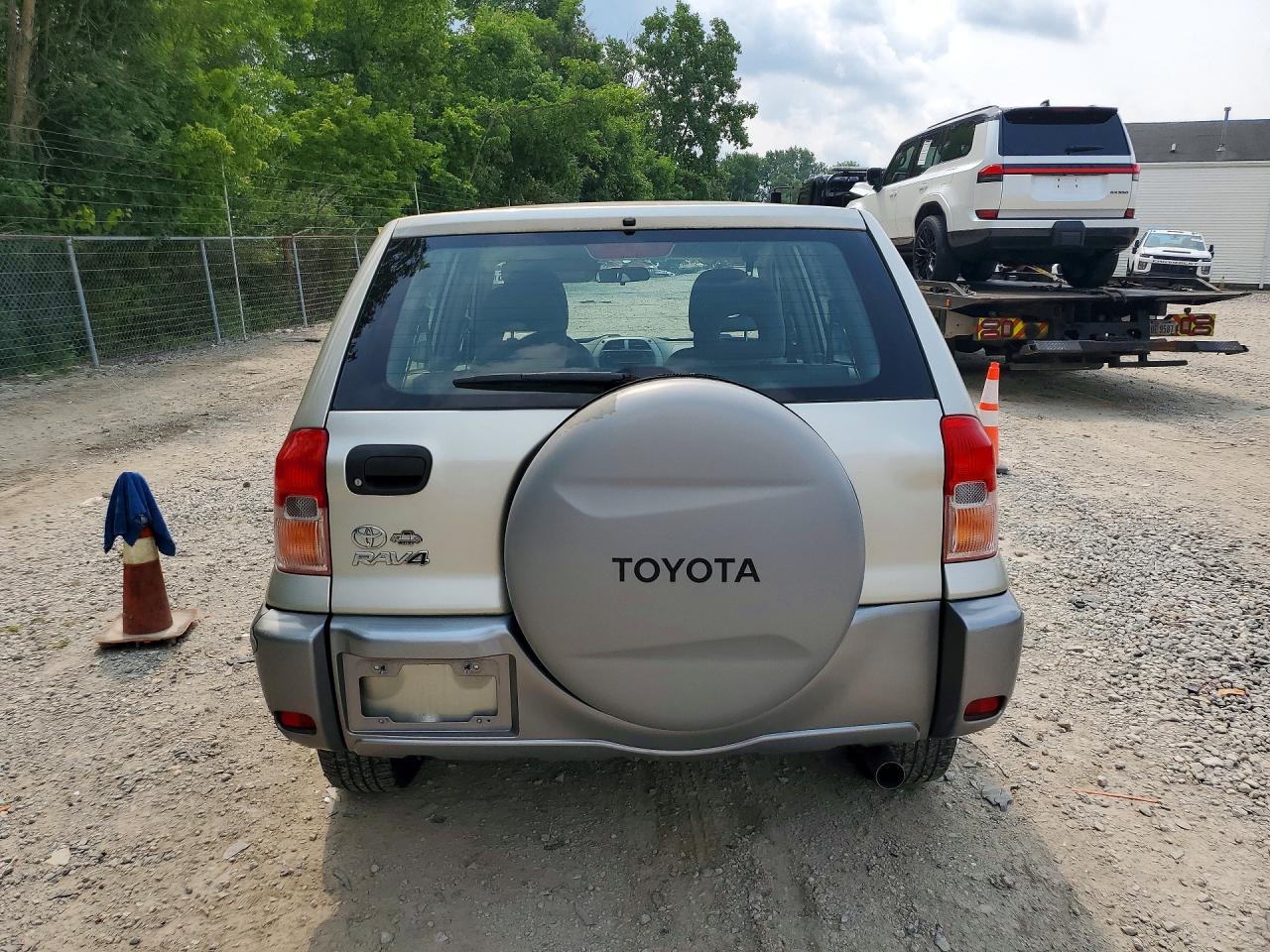 2003 Toyota Rav4 Base Кремовый vin: JTEGH20V230114077
