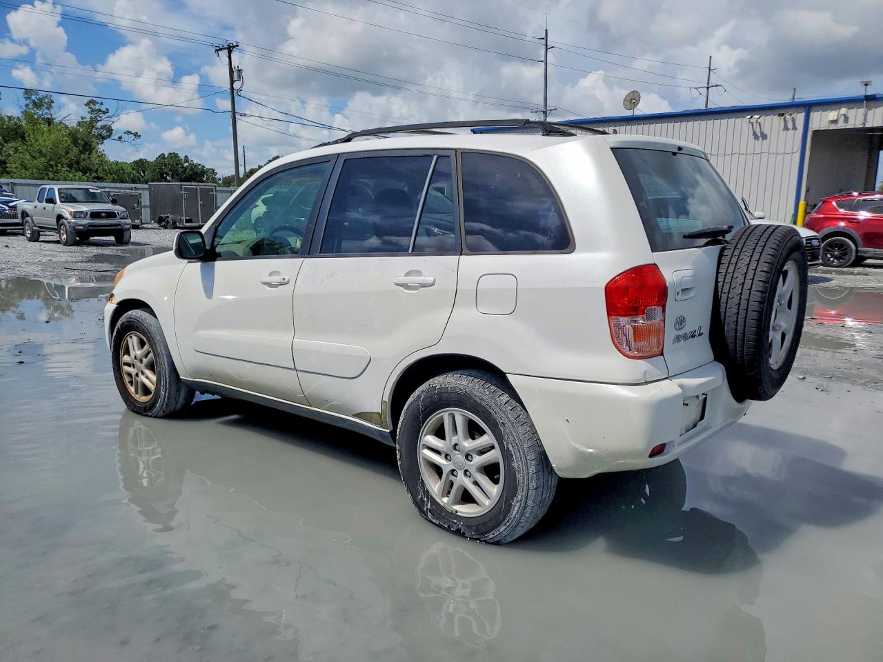 2002 Toyota Rav4 Base Белый vin: JTEGH20V720042632