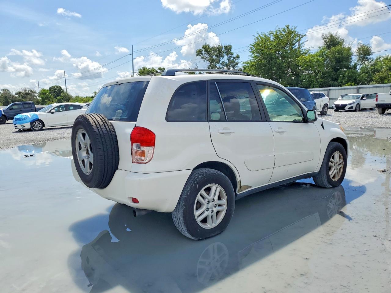 2002 Toyota Rav4 Base Белый vin: JTEGH20V720042632