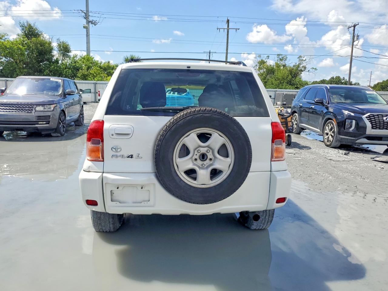 2002 Toyota Rav4 Base Белый vin: JTEGH20V720042632
