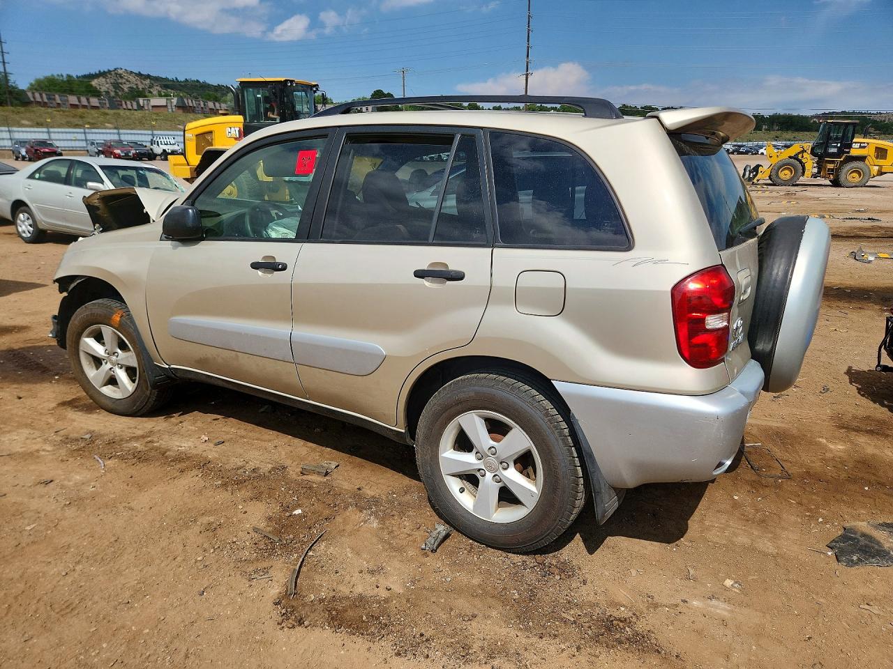 2004 Toyota Rav4 Base Tan vin: JTEHD20V040010902