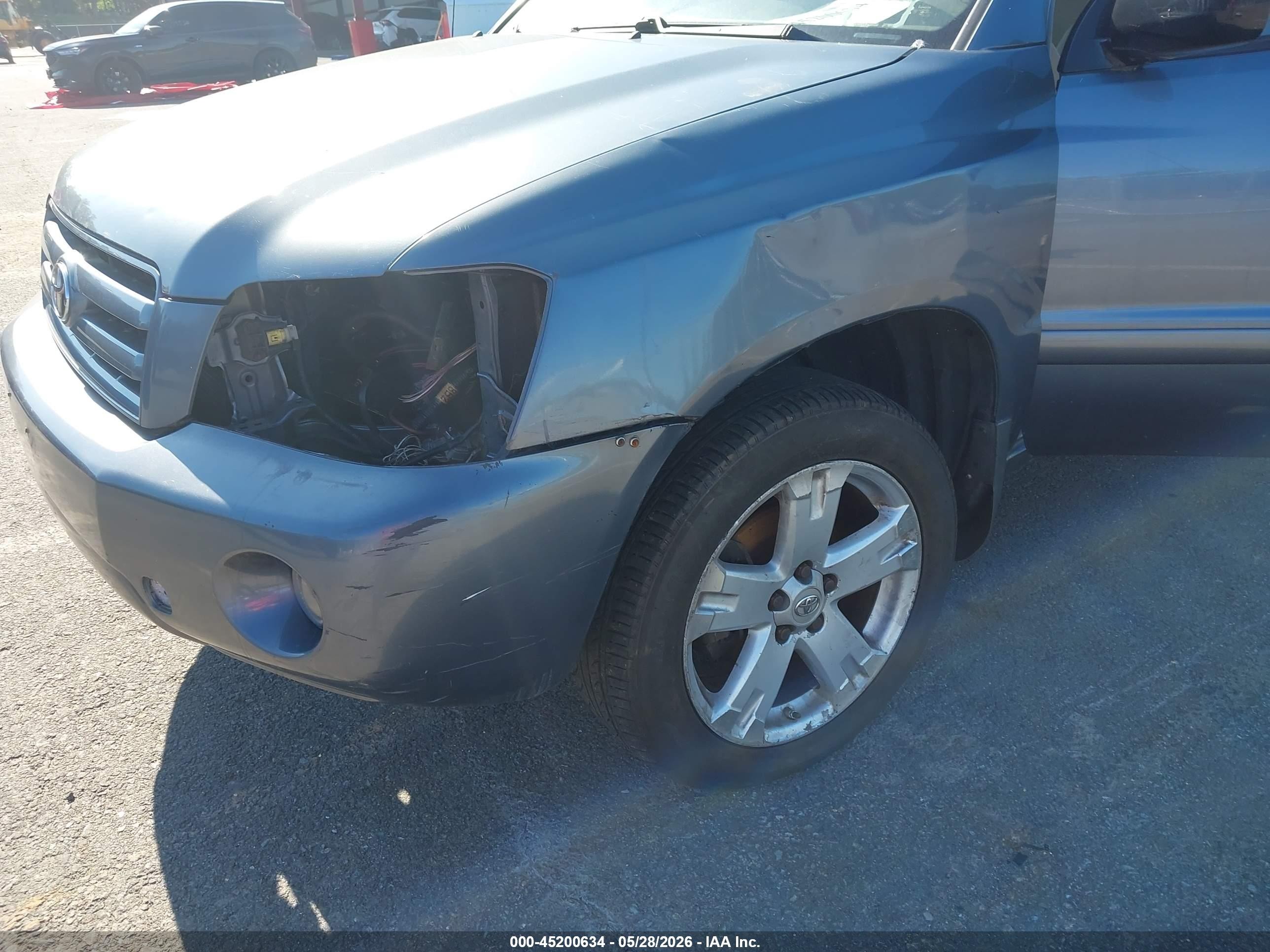 2006 Toyota Highlander   Blue vin: JTEHD21A760042454