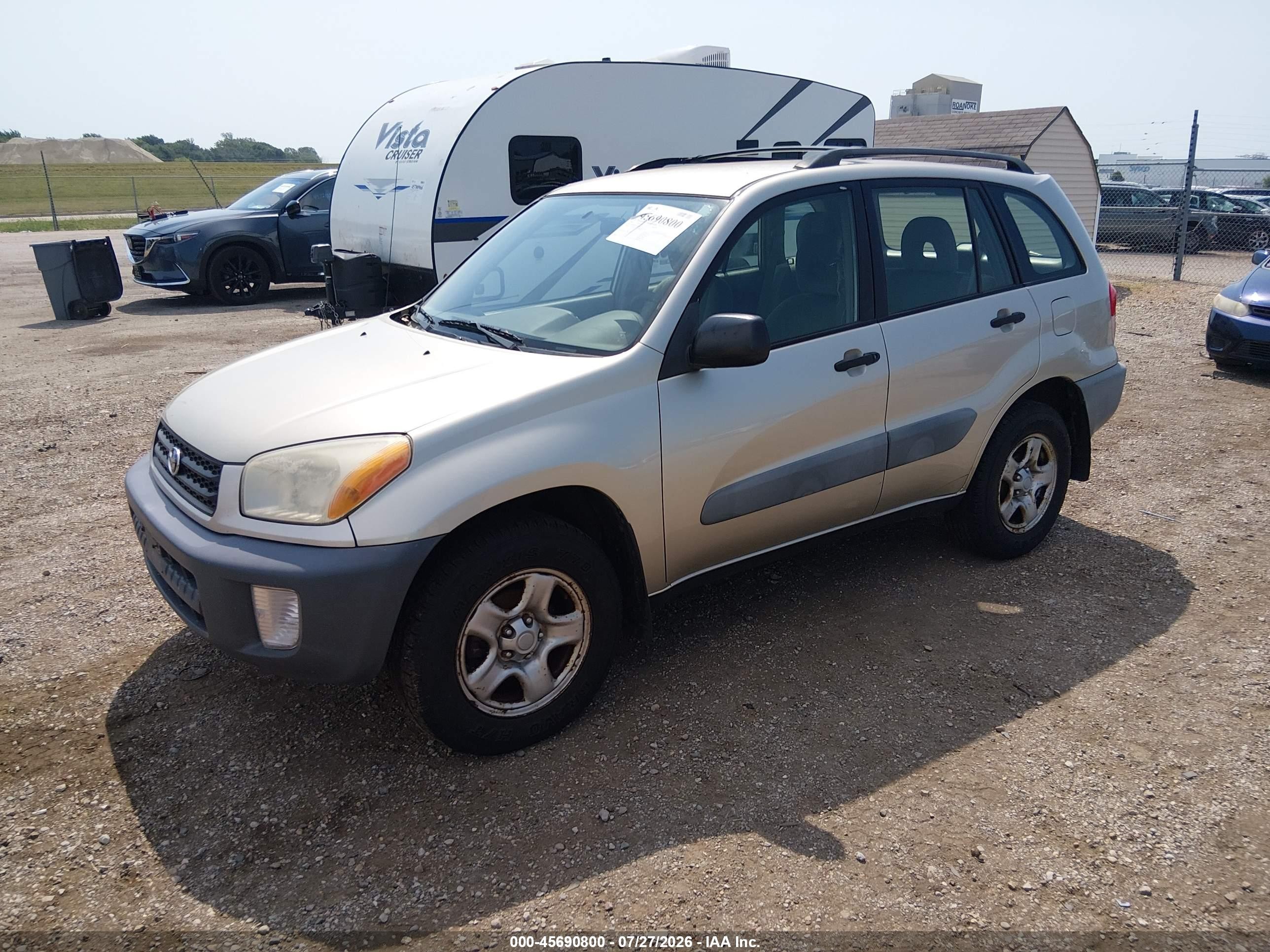 2001 Toyota Rav4   Tan vin: JTEHH20V110081008