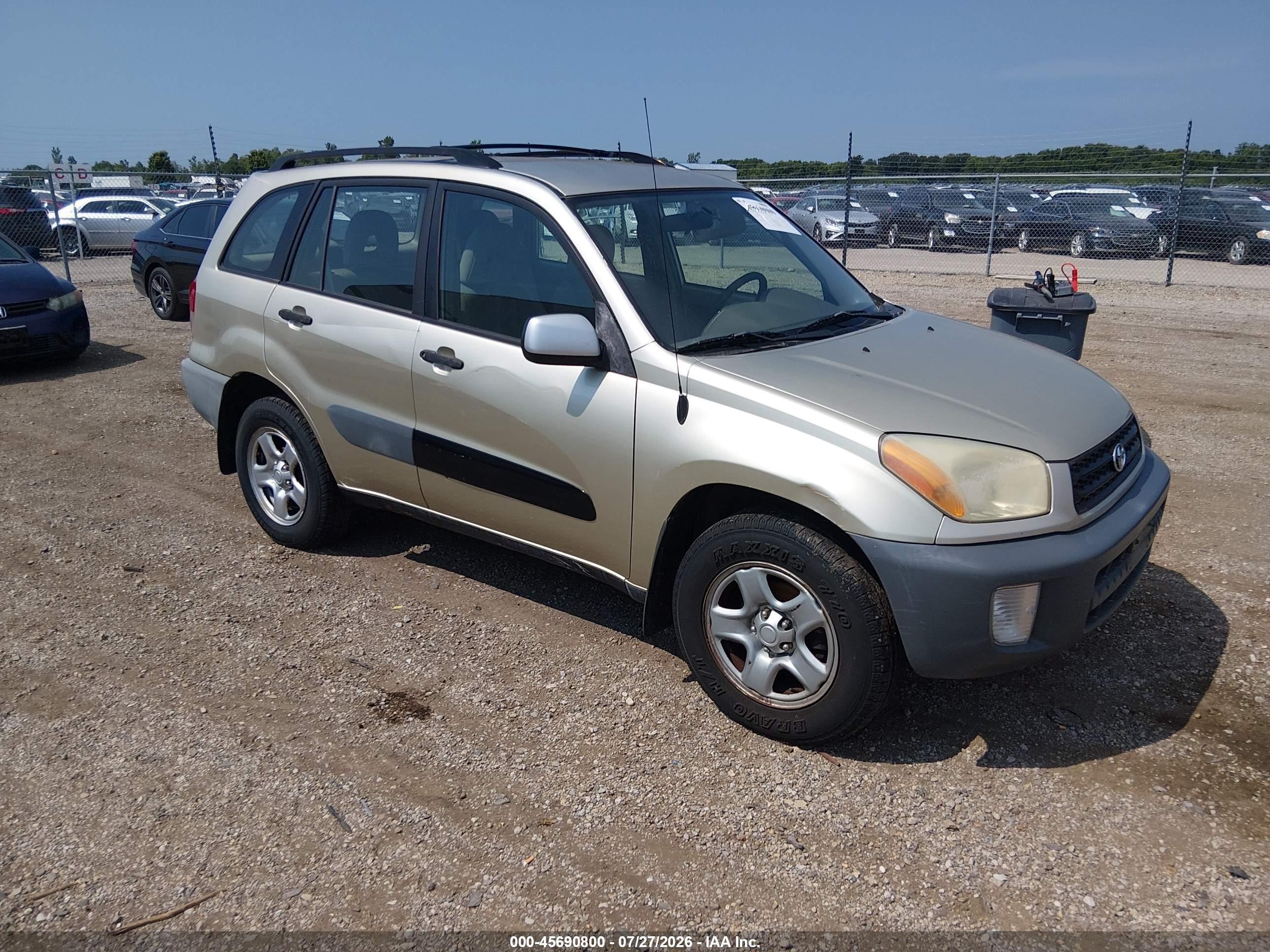 2001 Toyota Rav4   Tan vin: JTEHH20V110081008