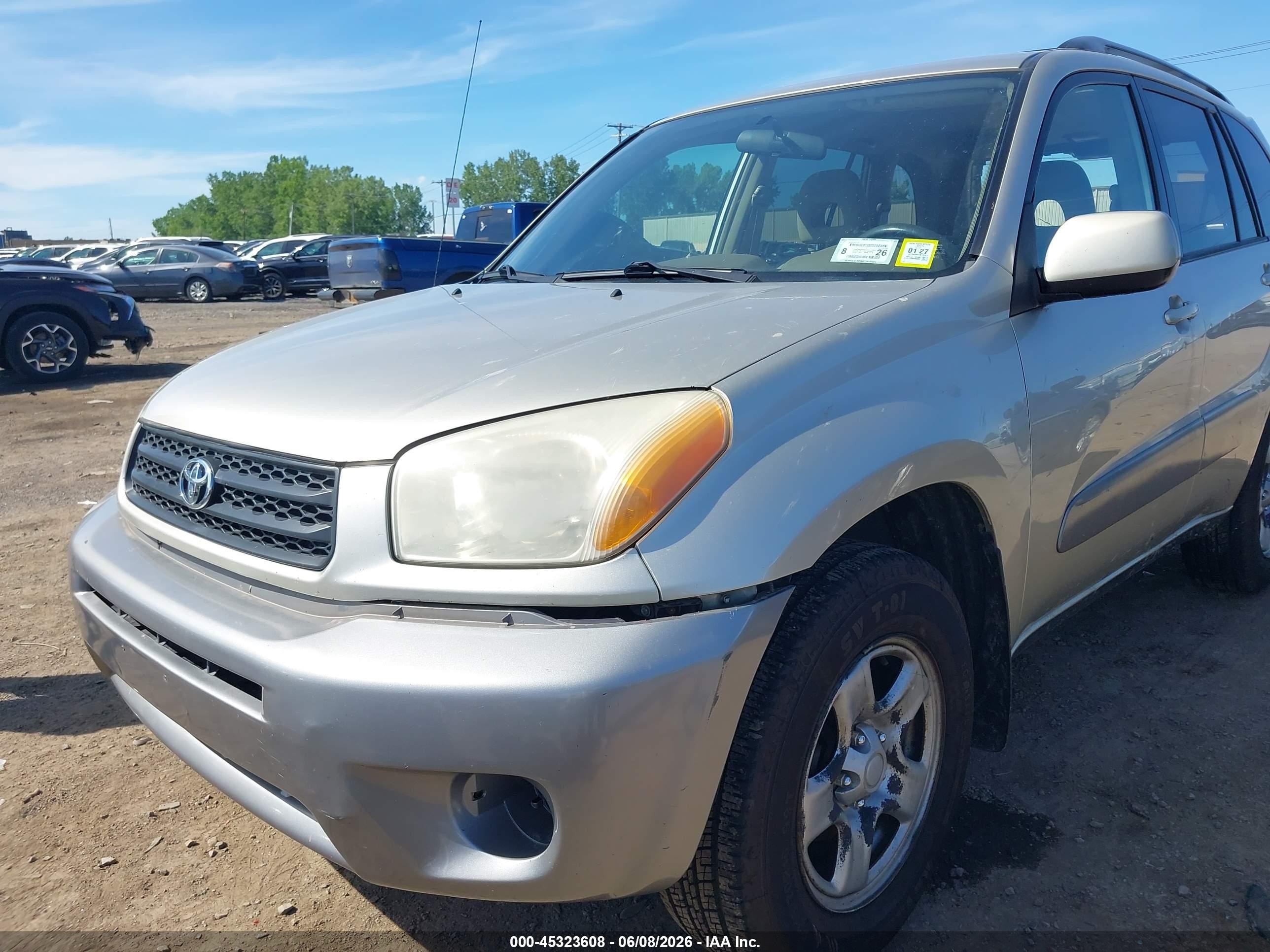 2001 Toyota Rav4   Tan vin: JTEHH20V110111284
