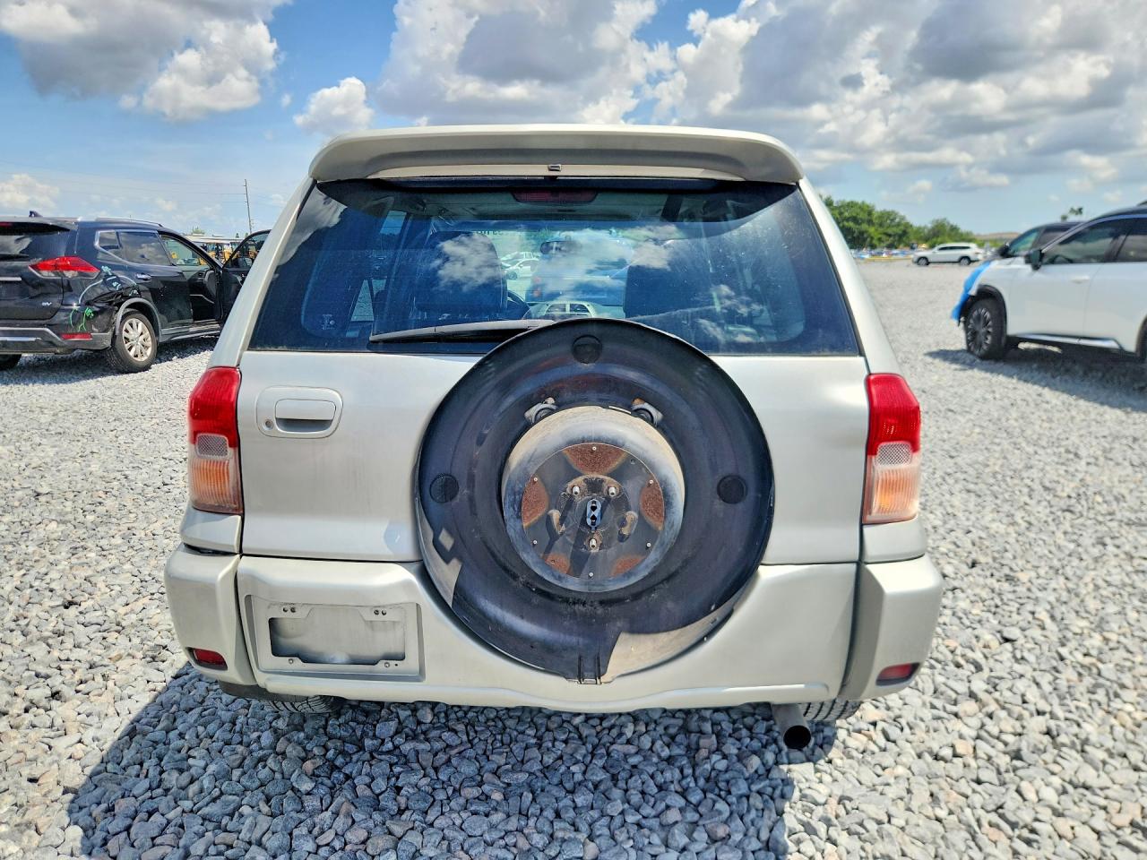 2001 Toyota Rav4 Base Tan vin: JTEHH20V410059780