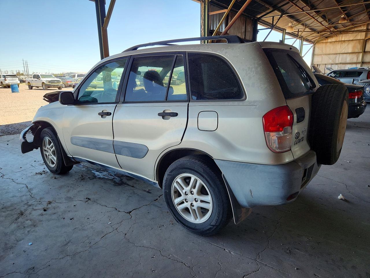 2001 Toyota Rav4 Base Tan vin: JTEHH20V910115325