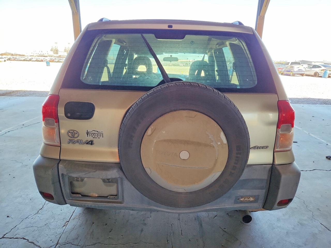 2001 Toyota Rav4 Base Tan vin: JTEHH20V910115325