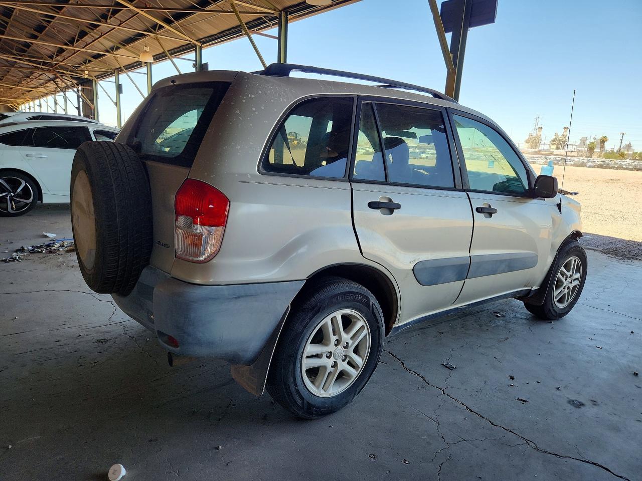 2001 Toyota Rav4 Base Tan vin: JTEHH20V910115325