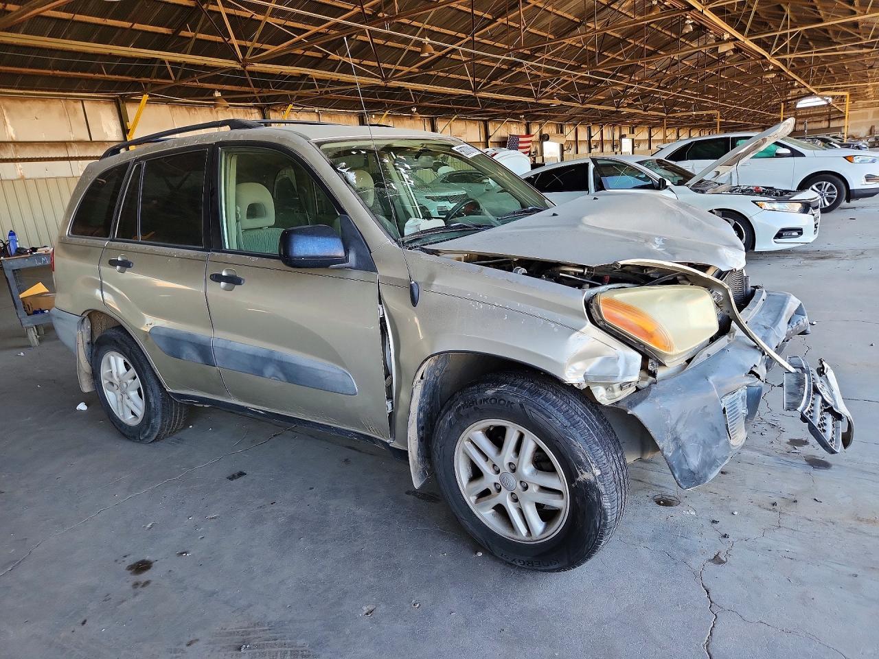 2001 Toyota Rav4 Base Tan vin: JTEHH20V910115325