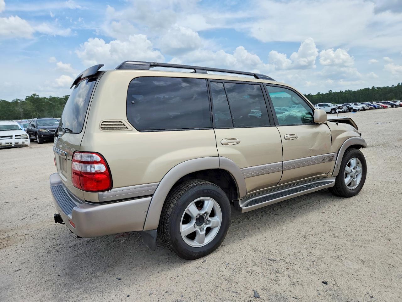 2005 Toyota Land Cruiser Base Gold vin: JTEHT05J252076662