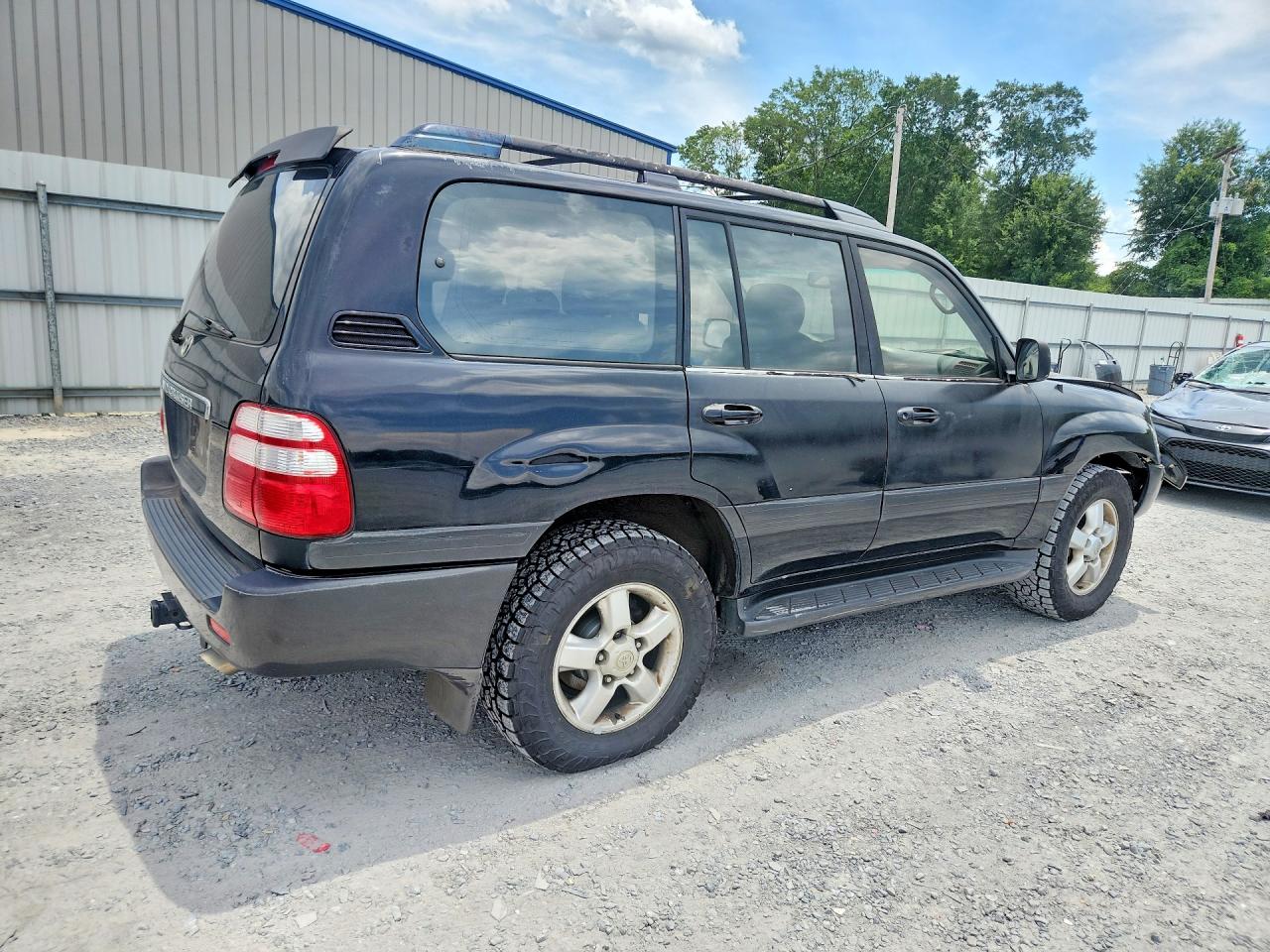 2003 Toyota Land Cruiser Base Black vin: JTEHT05J332041271