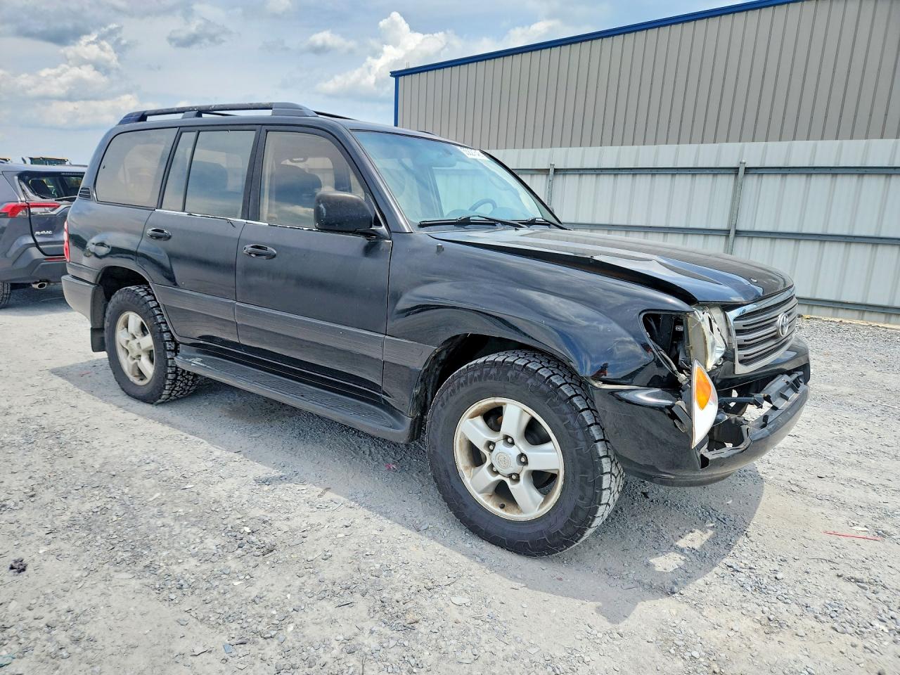 2003 Toyota Land Cruiser Base Black vin: JTEHT05J332041271