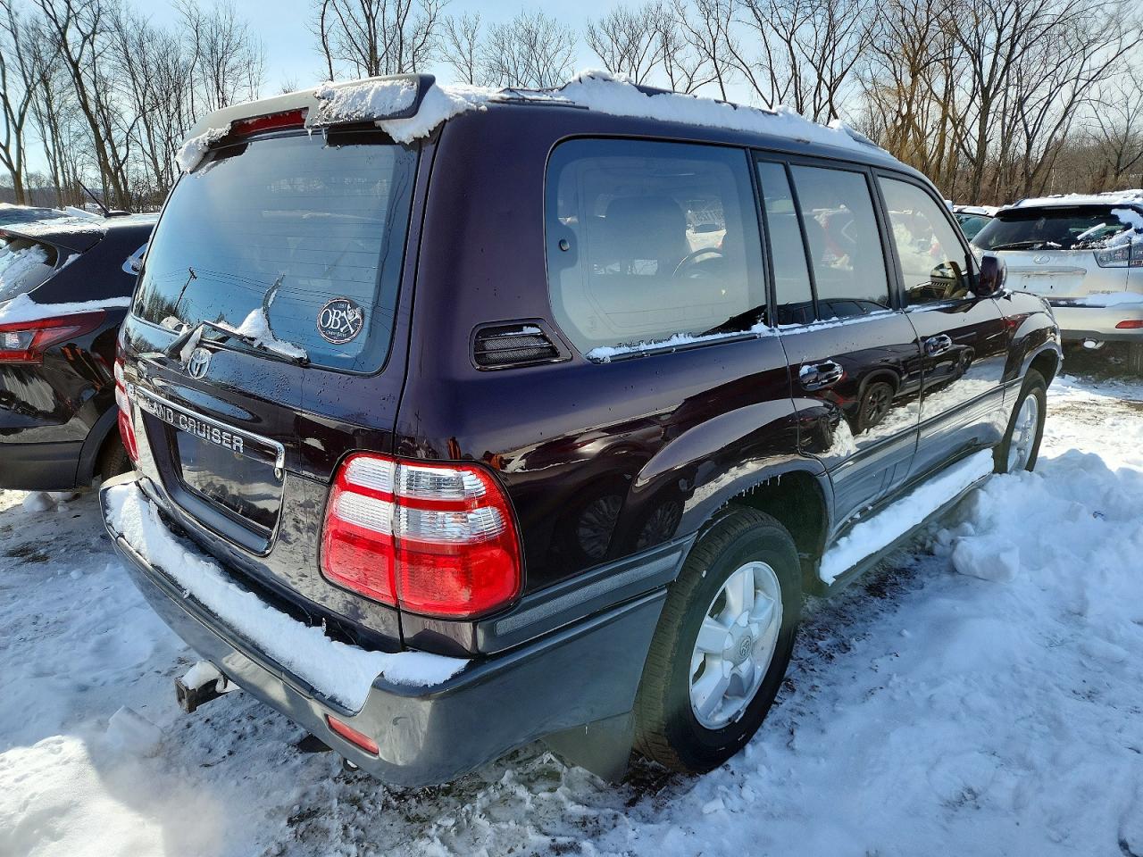 2003 Toyota Land Cruiser Maroon vin: JTEHT05J532041370
