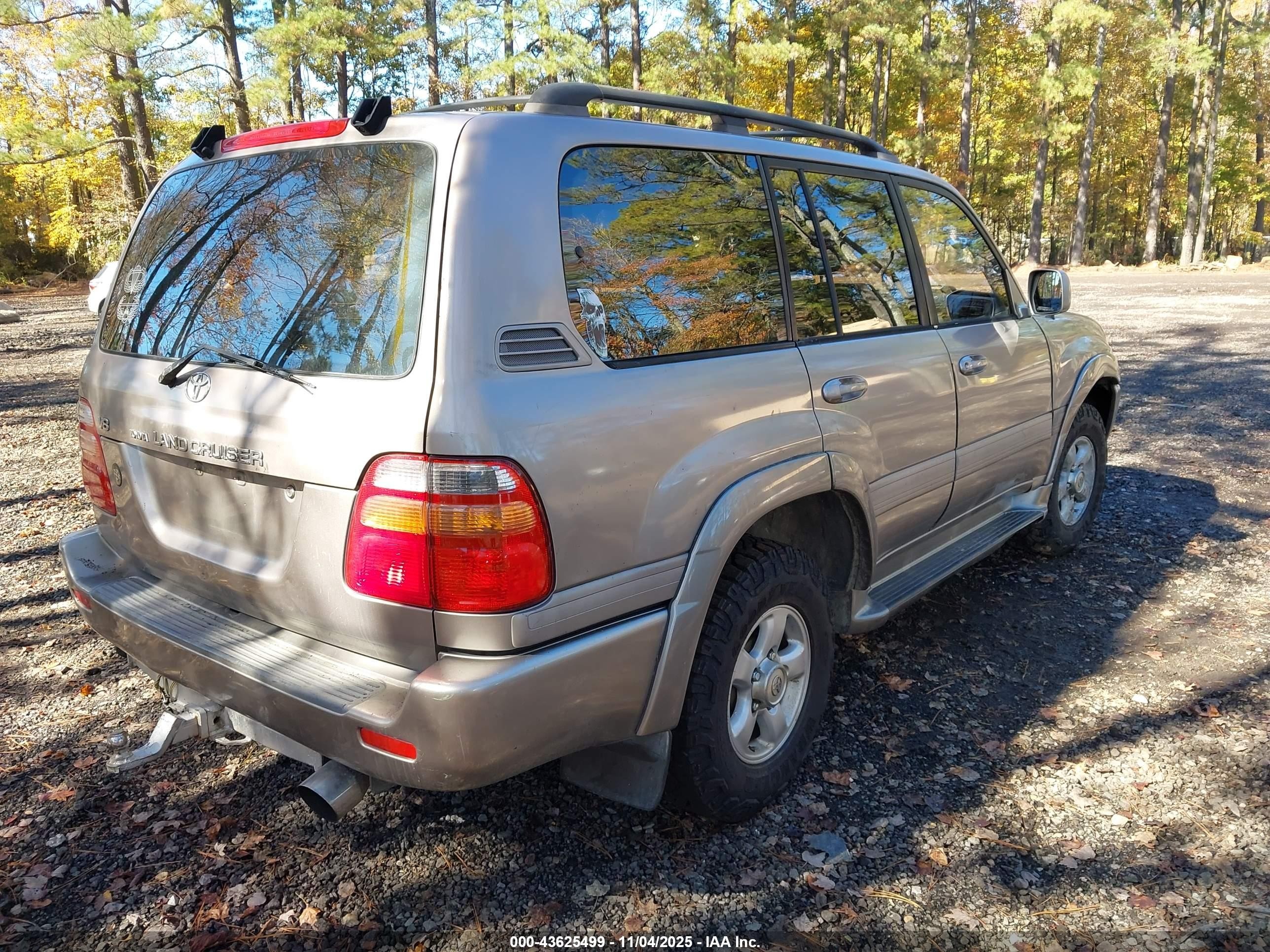 2001 Toyota Land Cruiser   Gold vin: JTEHT05J912000978