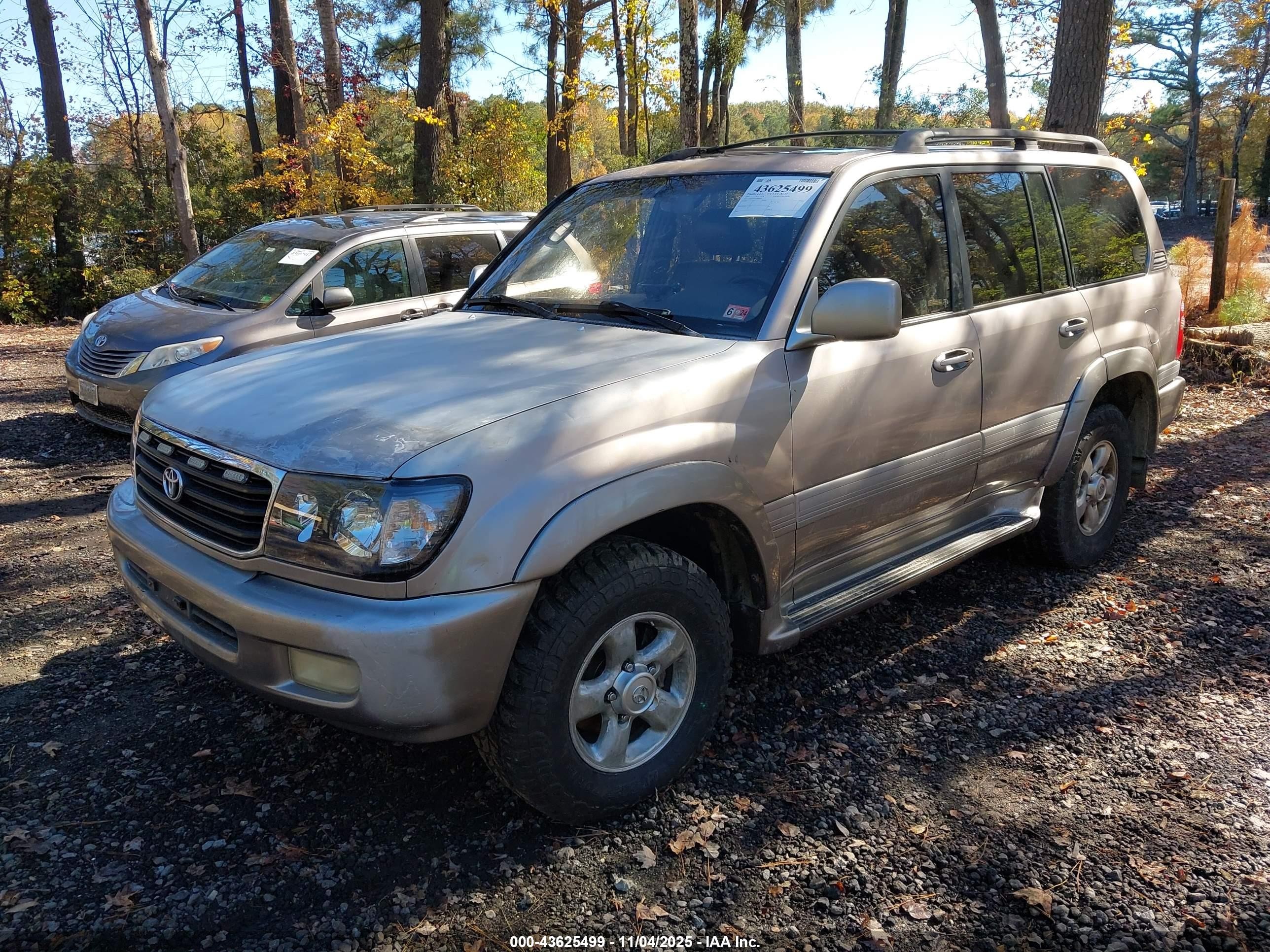 2001 Toyota Land Cruiser   Gold vin: JTEHT05J912000978