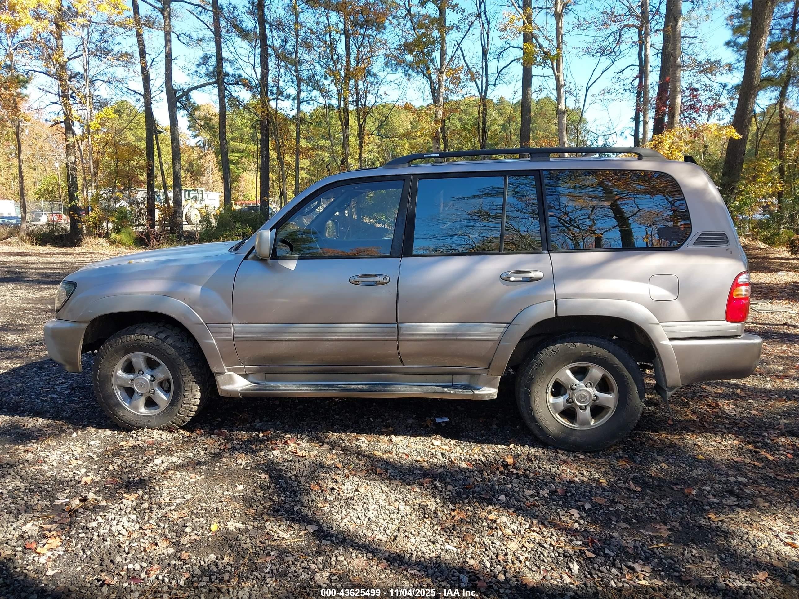 2001 Toyota Land Cruiser   Gold vin: JTEHT05J912000978