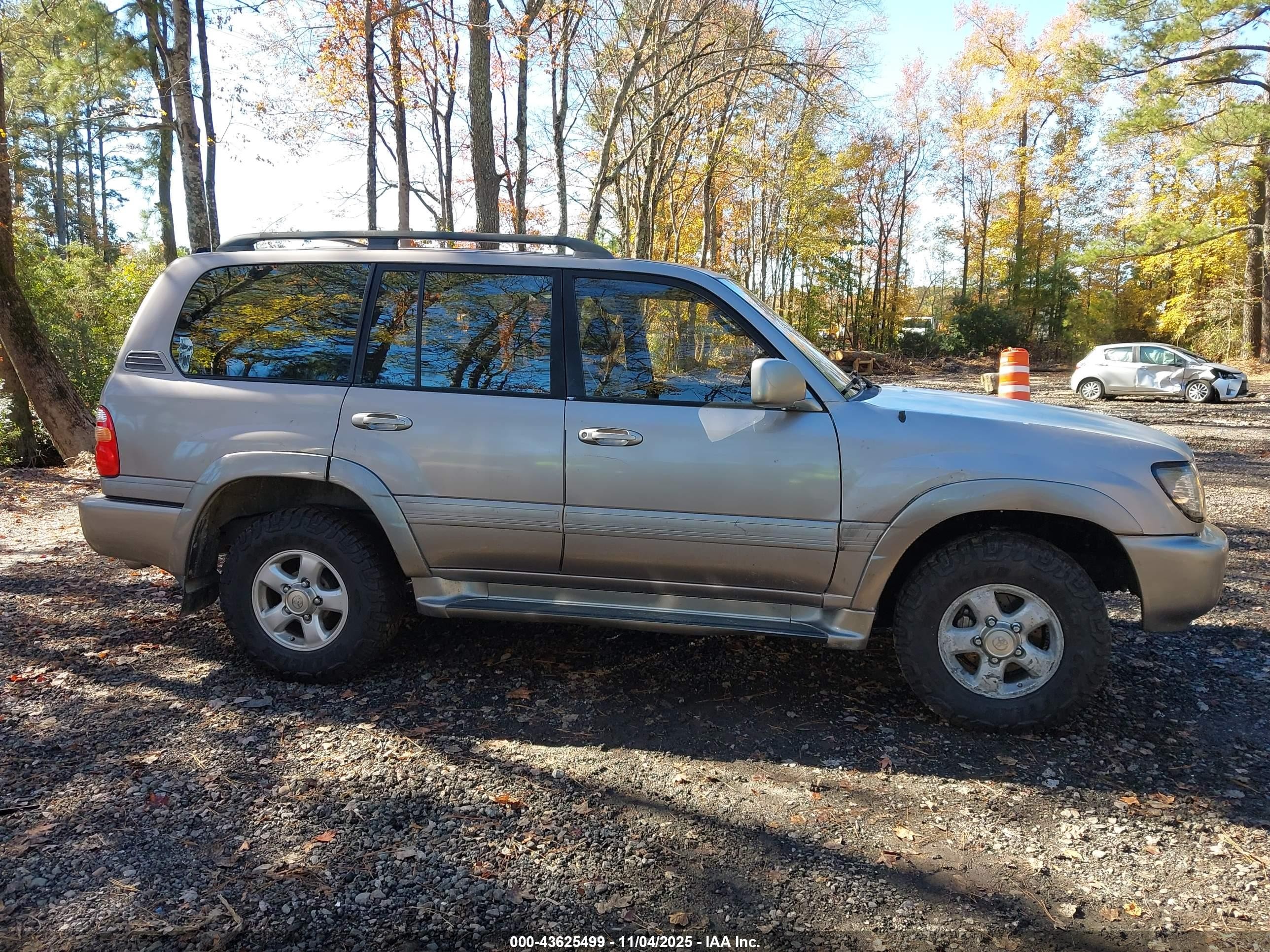 2001 Toyota Land Cruiser   Gold vin: JTEHT05J912000978