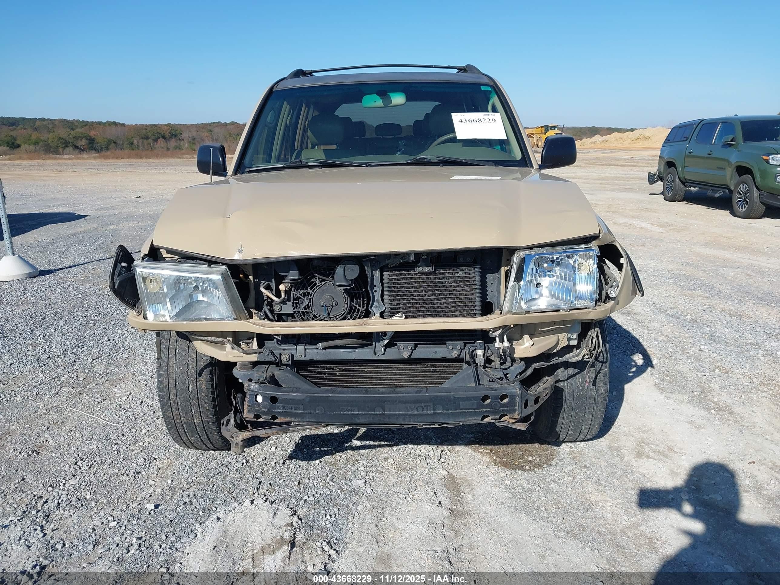 2001 Toyota Land Cruiser   Tan vin: JTEHT05J912009681
